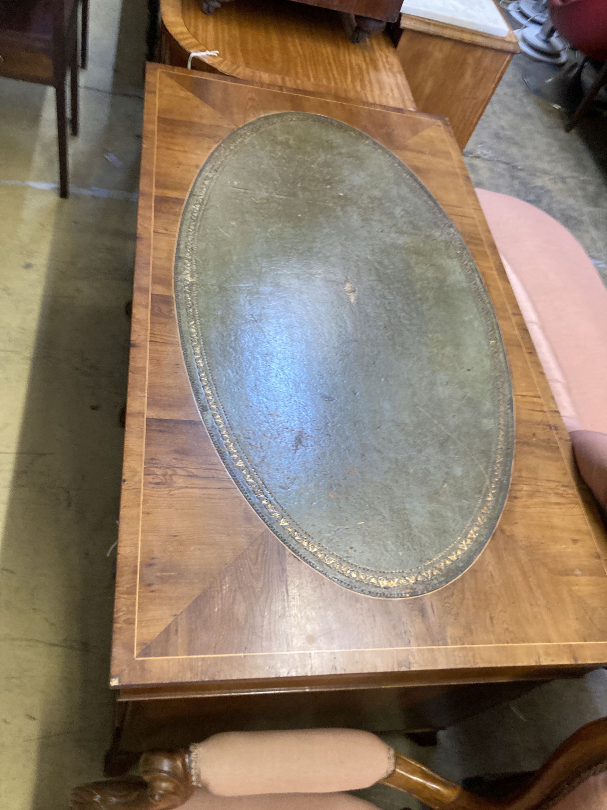 A George III style yew pedestal desk, length 122cm, depth 69cm, height 74cm